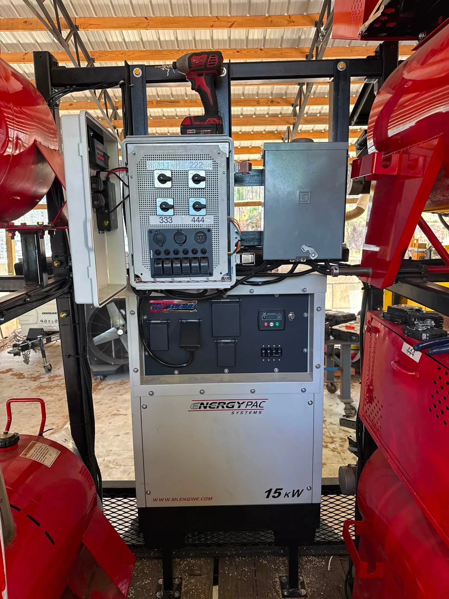Close-up of equipment control panels and generator.
